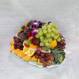 Large fruit platter party tray fresh cut pineapple melons grapes strawberries