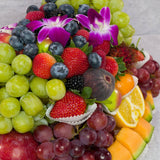 Gourmet fruit centerpiece platter fresh cut seasonal fruits party catering tray