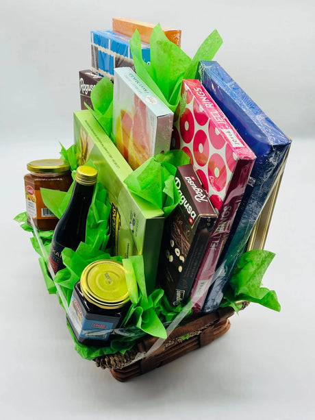 Gourmet gift basket NYC premium chocolates preserves wine wicker basket