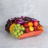 Fresh cut fruit tray arrangement cantaloupe kiwi mango blueberries raspberries